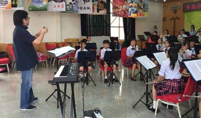 Z6·尊龙凯时示范乐团青岛台东六路小学管乐团大师班活动成功举办