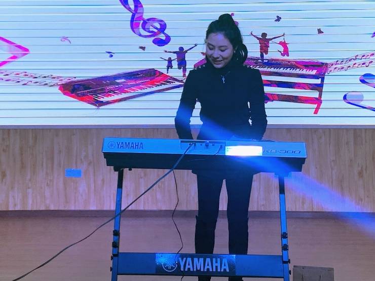 让音乐陪伴成长 雅马哈乐器捐赠爱心行动走进重庆市长寿区江南九年制学校